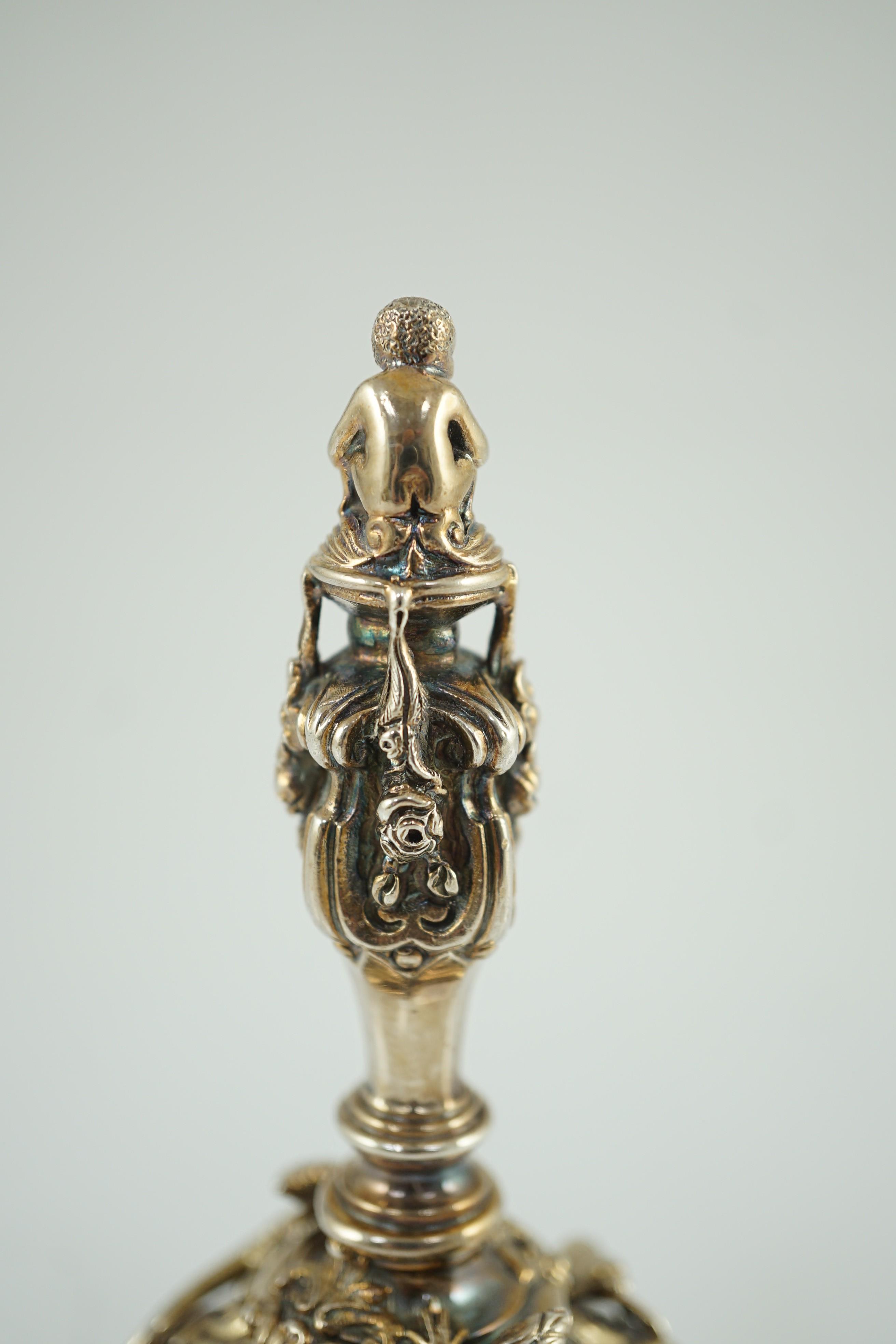 An Elizabeth II cast silver hand bell, by Garrard & Co.